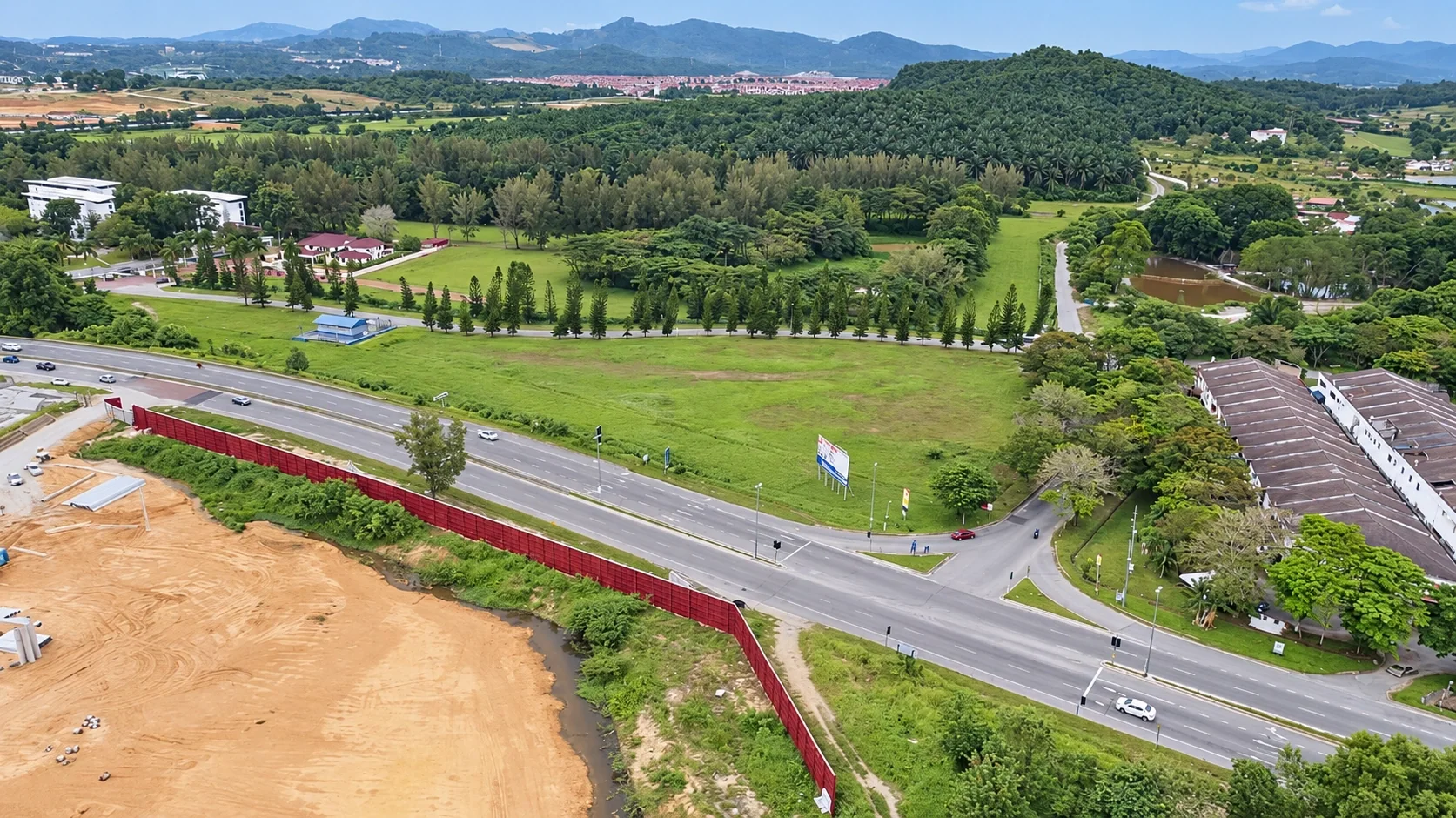 Enhanced aerial photograph of the site setting along Jalan Broga, showing the surrounding roads, greenery and neighbourhood